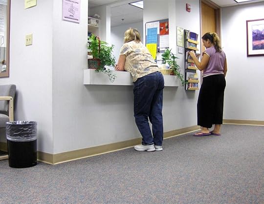Woman waiting for dizziness diagnosi.
