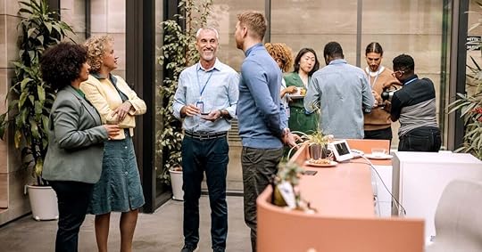 Sellers reconnect after a sales kickoff session to discuss learning.