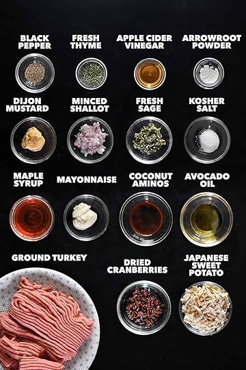An overhead shot of the raw ingredients to make cranberry turkey meatballs topped with a maple dijon mustard glaze.