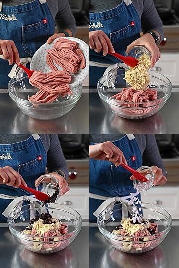 Adding ground turkey, shredded Japanese sweet potato, dried cranberries, and minced shallot to a glass mixing bowl to make cranberry turkey meatballs.