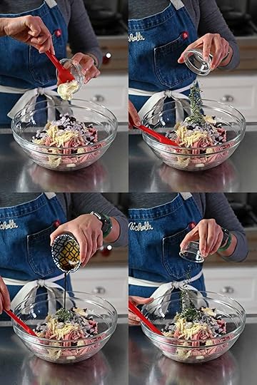 Adding mayonnaise, chopped sage, coconut aminos, and minced thyme to a mixing bowl filled with ingredients to make cranberry turkey meatballs.
