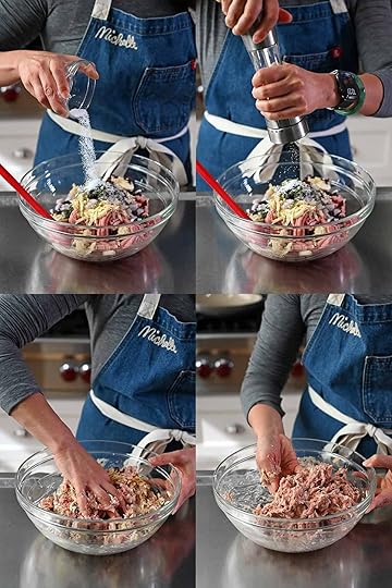 Adding salt and pepper to the bowl with cranberry turkey meatballs and then mixing everything together by hand.