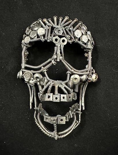 skull made of screws, nuts, and botls