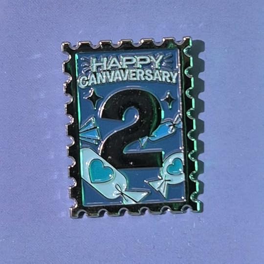 A commemorative Canvaversary badge featuring the text 'Happy Canvaversary' and the number '2', displayed on a blue background with decorative designs.