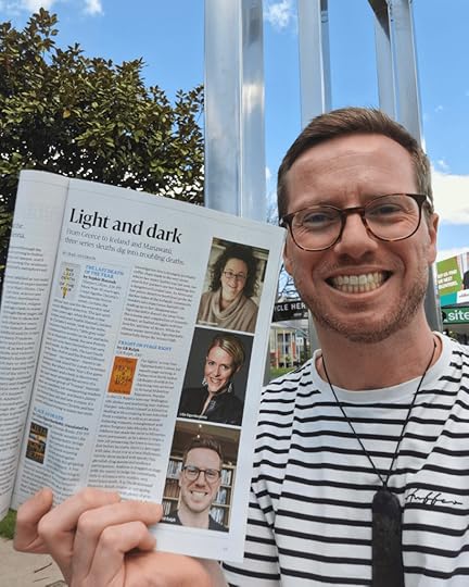 Selfie holding up the New Zealand Listener magazine in print