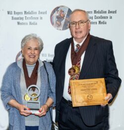 Author Preston Lewis and Harriet Lewis Holding Will Rogers Awards