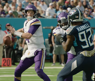 image of a football player in the nfl getting ready to throw a pass