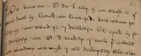 A manuscript in which two instances of the word "head" have been replaced by small faces