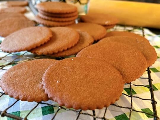 brown cookies piled on a rack