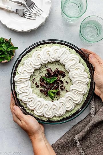 hands holding creme de menthe mint chocolate pie.