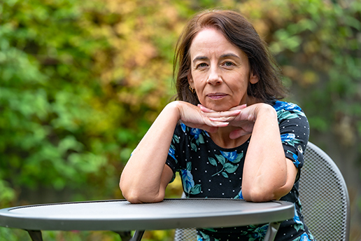 Jane Killick sitting outside