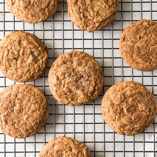 Nine fresh-baked dirty chai snickerdoodle cookies cooling on a cooling rack.