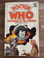 Paperback first edition of Doctor Who The Revenge of the Cybermen (1976) by Terrance Dicks, cover art by Chris Achilleos showing the Fourth Doctor, a Cyberman and a Vogan