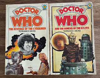 Paperback first editions of Doctor Who The Revenge of the Cybermen and Doctor Who and the Genesis of the Daleks, artwork by Chris Achilleos, demonstrating the different font size in titles