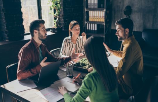 Team brainstorming content ideas to illustrate the point that agentic AI will not kill your content marketing.
