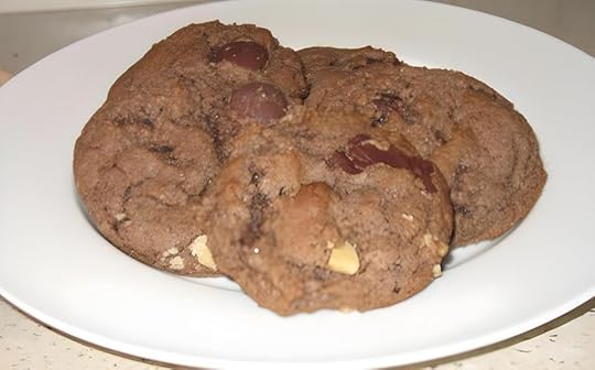 White plate with whole wheat chocolate chip cookies atop