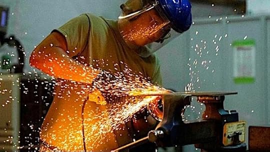 Air Force Senior Airman Gino Lopez grinds metal for aircraft repair at an undisclosed location, Sept. 24, 2020. (U.S. Air National Guard photo by Air Force Master Sgt. Jonathan Young)