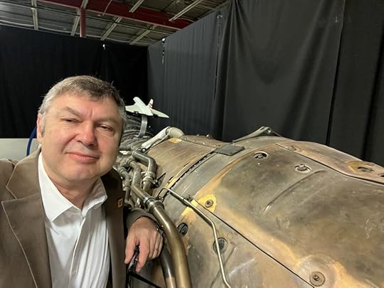 LibertyWorks Research and Technology senior vice president John Kusnierek with a Rolls-Royce Olympus engine used on the Concorde supersonic jet. (Photo courtesy of Rolls-Royce)
