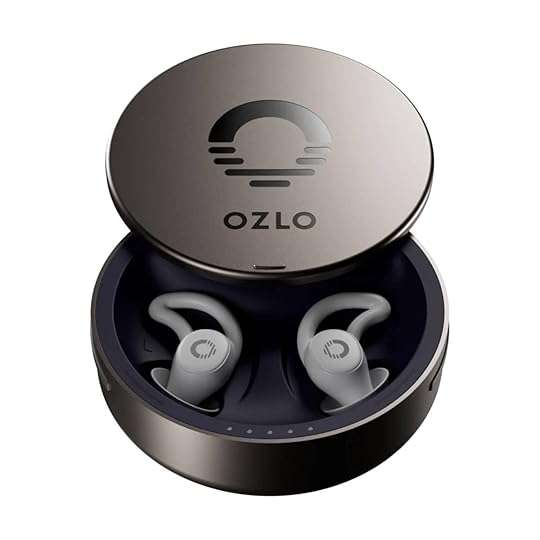An open Ozlo charging holder filled with Ozlo sleepbuds, an item on the 2025 Nom Nom Paleo holiday gift guide.