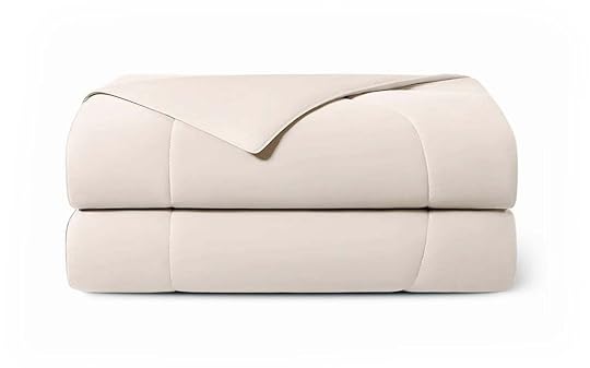 An off-white folded Rest comforter, an item on the 2025 Nom Nom Paleo Holiday Gift Guide.