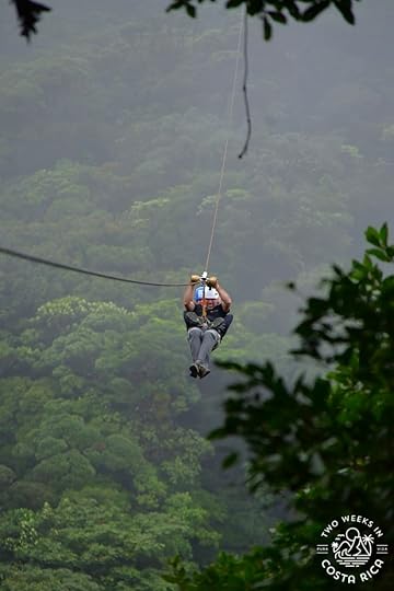 two people tandem ziplining Treetopia Park Monteverde