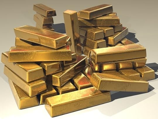 Pile of shiny gold bars symbolizing wealth, prosperity, and the 5 most powerful mantras for abundance