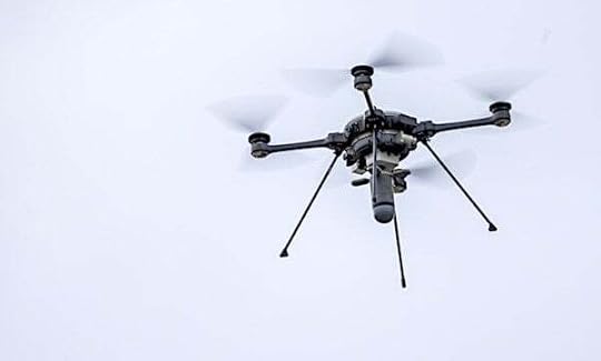 An R80D SkyRaider small unmanned aircraft system (SUAS) carries a Mjolnir munitions system during a combined arms live-fire training exercise involving the employment of SUAS to deliver munitions on designated targets at Camp Lejeune, North Carolina, July 3, 2025. (U.S. Marine Corps photo by Cpl. Zachariah Ferraro)