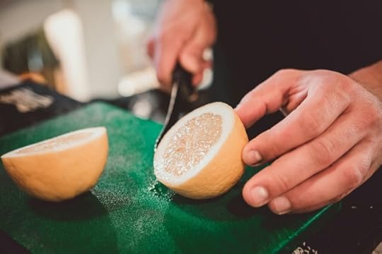 A lemon being sliced. What do you do with lemons life hands to you?