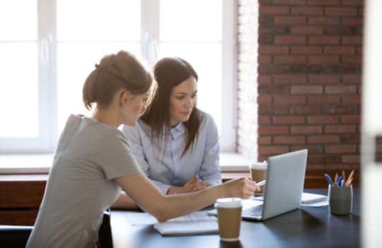 Two women working on a laptop to illustrate the concept of 