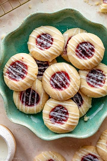 raspberry almond thumbprints on blue plate.