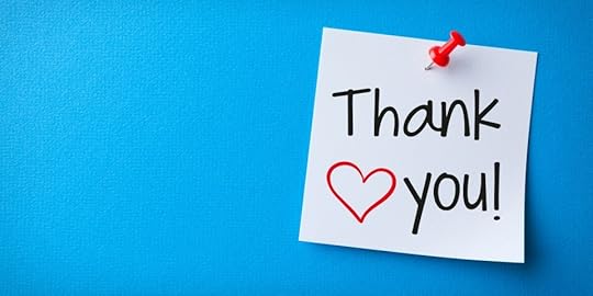 A thank you note on a blue background with a red heart drawn next to the words 'Thank you!'