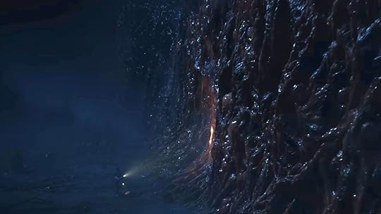 Hopper and Eleven use a flashlight to look at the giant flesh wall on Stranger Things 5