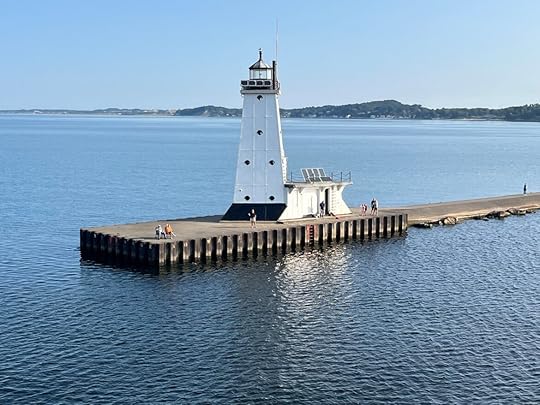 A scenic river with a biblical verse from Isaiah 43:2-3 about God's protection and redemption.