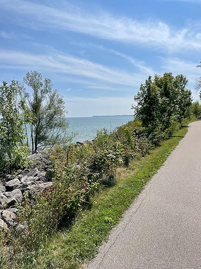 A scenic river with a biblical verse from Isaiah 43:2-3 about God's protection and redemption.