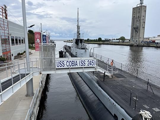 A scenic river with a biblical verse from Isaiah 43:2-3 about God's protection and redemption.