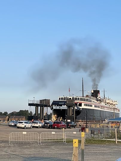A scenic river with a biblical verse from Isaiah 43:2-3 about God's protection and redemption.