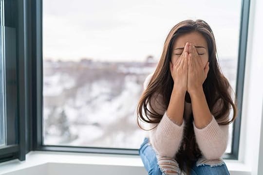 Woman experiencing dizziness from vertigo and anxiety