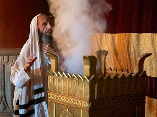 Zechariah in the holy of holies talking to the angel about his promise.