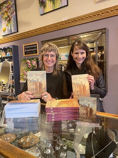 Cathy Hope and Sarah Emsley at Lady Luck, holding copies of The Austens
