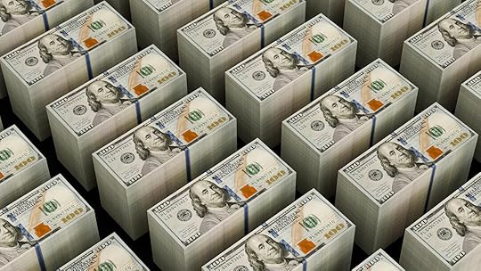 Stacks of hundred dollar bills are shown.