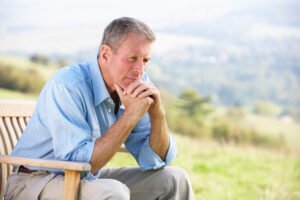 man pondering on how he has grown this past year