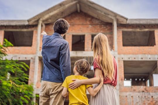 Family gazing at a house under construction—mission statement vs vision in real life.