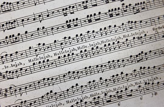 A close-up image of several lines of the musical score of 