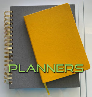 Picture of two planners with the caption "Planners"