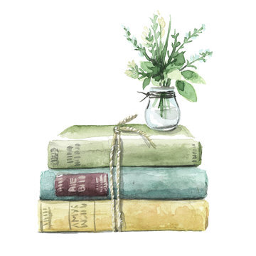 stack of books with greenery on white background