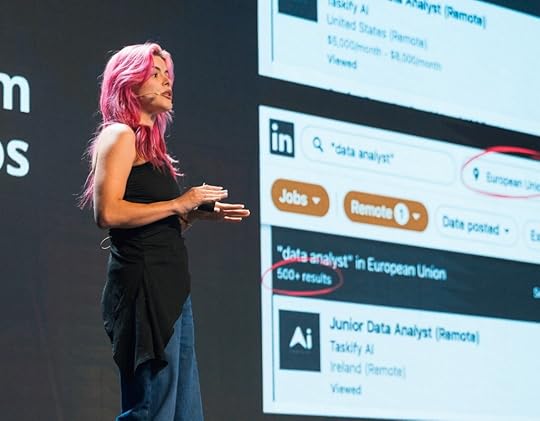 Photo of Tammy on stage at a speaking engagement. 