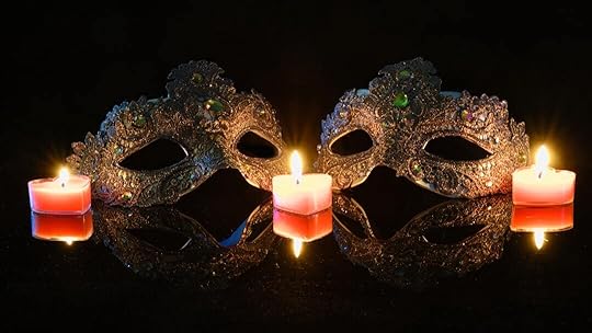 A couple of masks sitting on top of a table