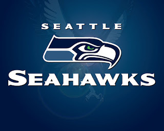 Image with a blue background and white letters, with the words SEATTLE SEAHAWKS