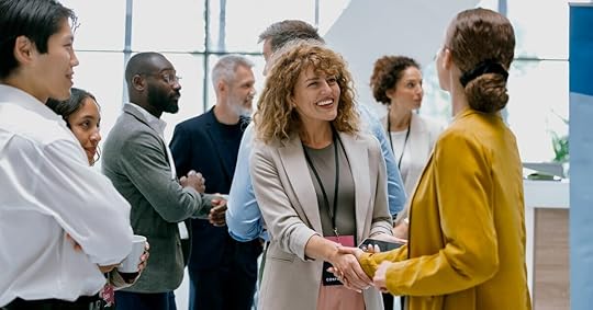 Sellers mingle after a sales kickoff session.