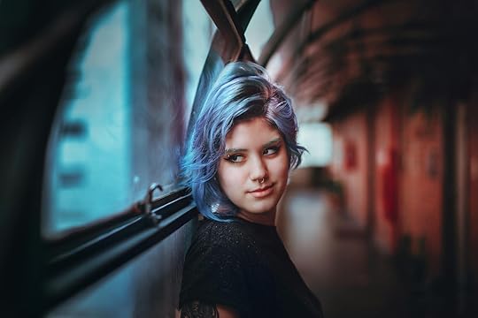 contemplative stylish teenager standing in corridor - Seen on our terms - neurodivergent identity, non-conforming expression, 